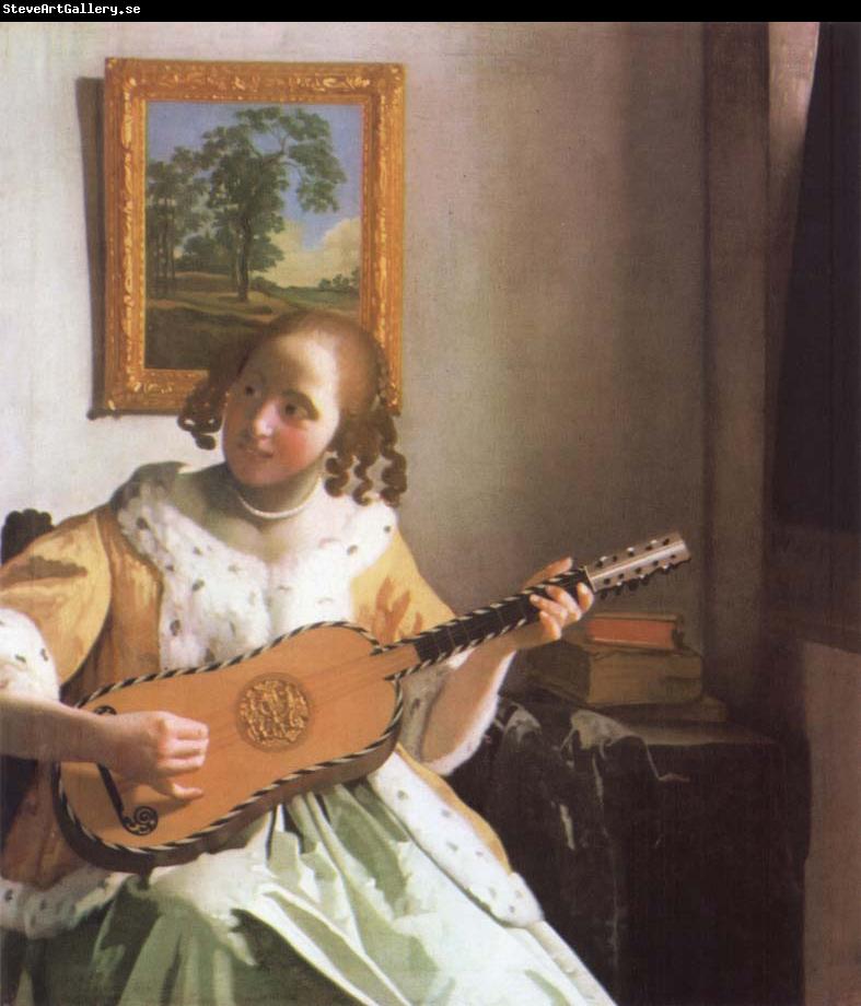 Jan Vermeer Woman is playing Guitar